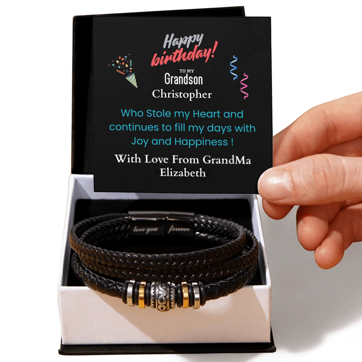 Black leather bracelet with charms in a box with a personalized birthday card.