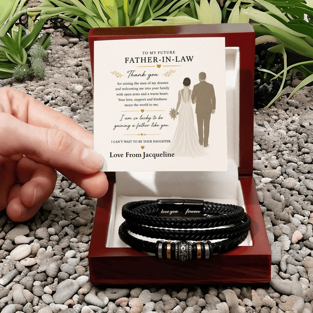 Bracelets in a box with a personalized card for future father-in-law on a pebbled surface.