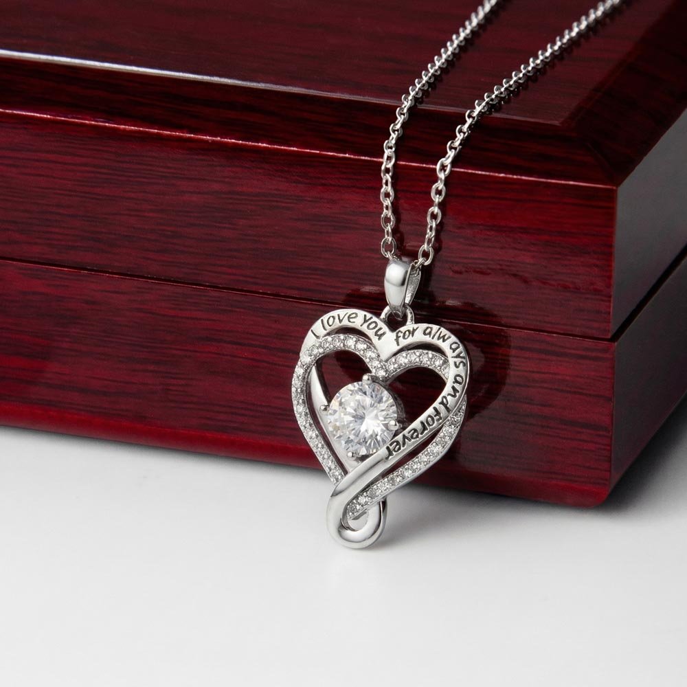 picture-of-14k-White-Gold-Finish-Love-you-always-engraved-heart-pendant-necklace-draped-over-a-luxury-gift-box
