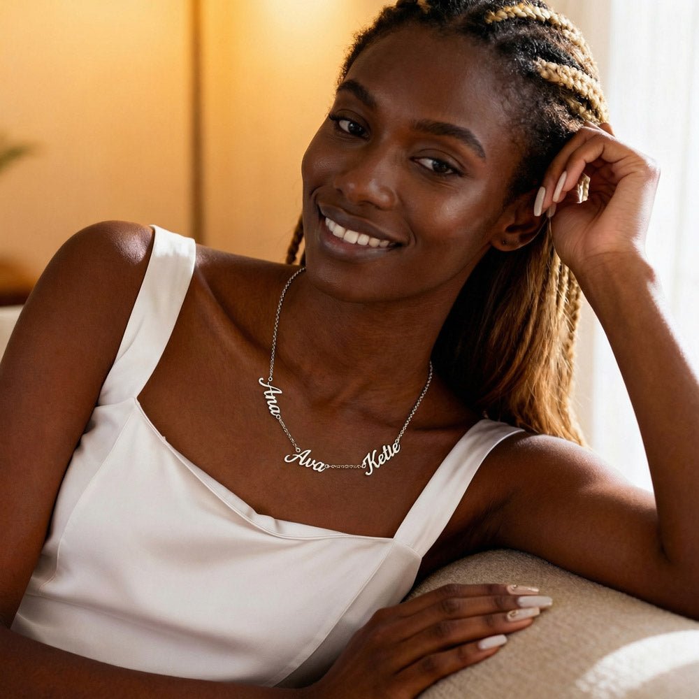 Woman-wearing-polished-stainless-steel-3-name-necklace.