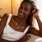 Woman-wearing-polished-stainless-steel-3-name-necklace.