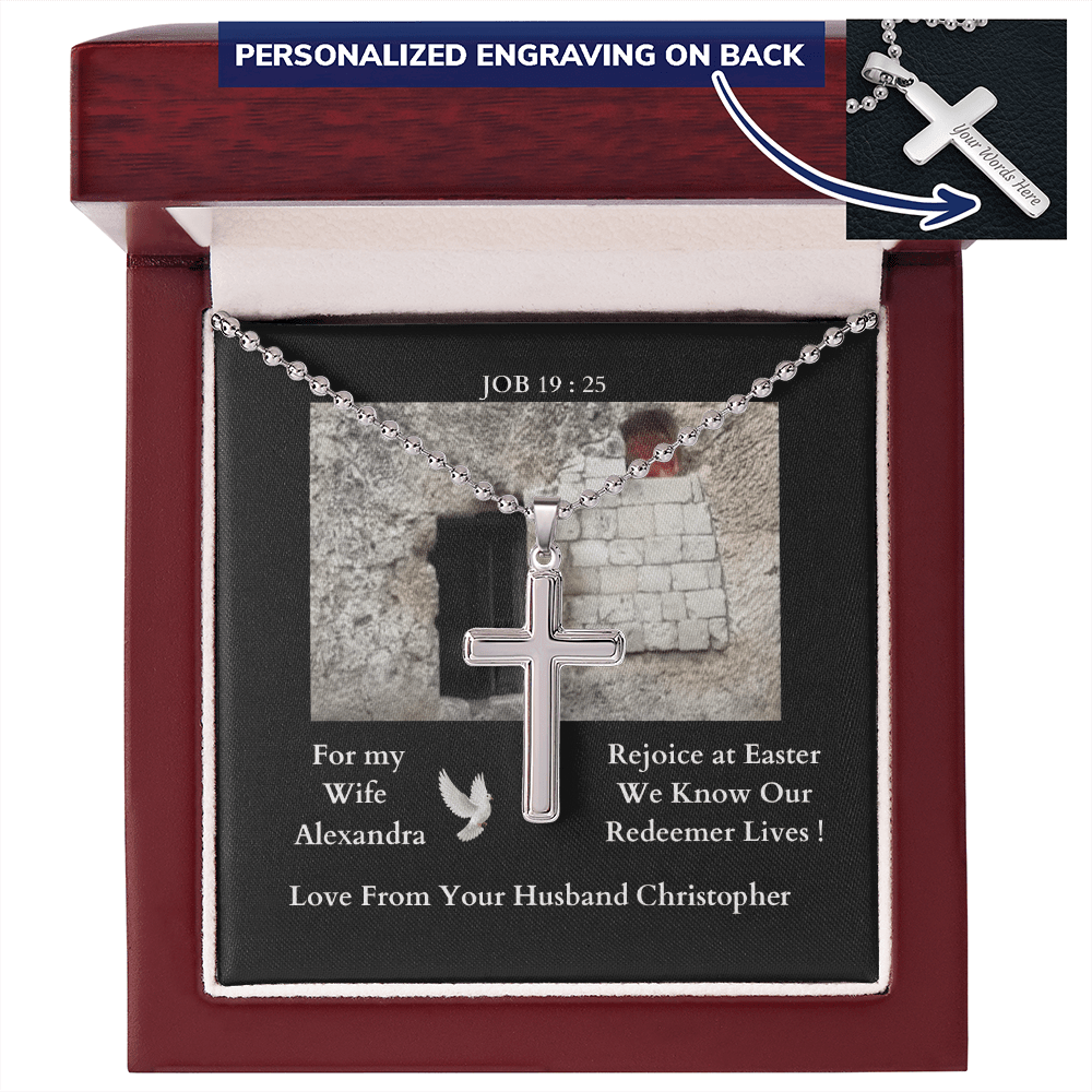 polished-stainless-steel-christian-cross-with- military-style-ball-chain-necklace-in-led-lit-mahogany-jewelry-gift-box-with-arrow-pointing-to-how-the-cross-can-be-engaved-on-its-back