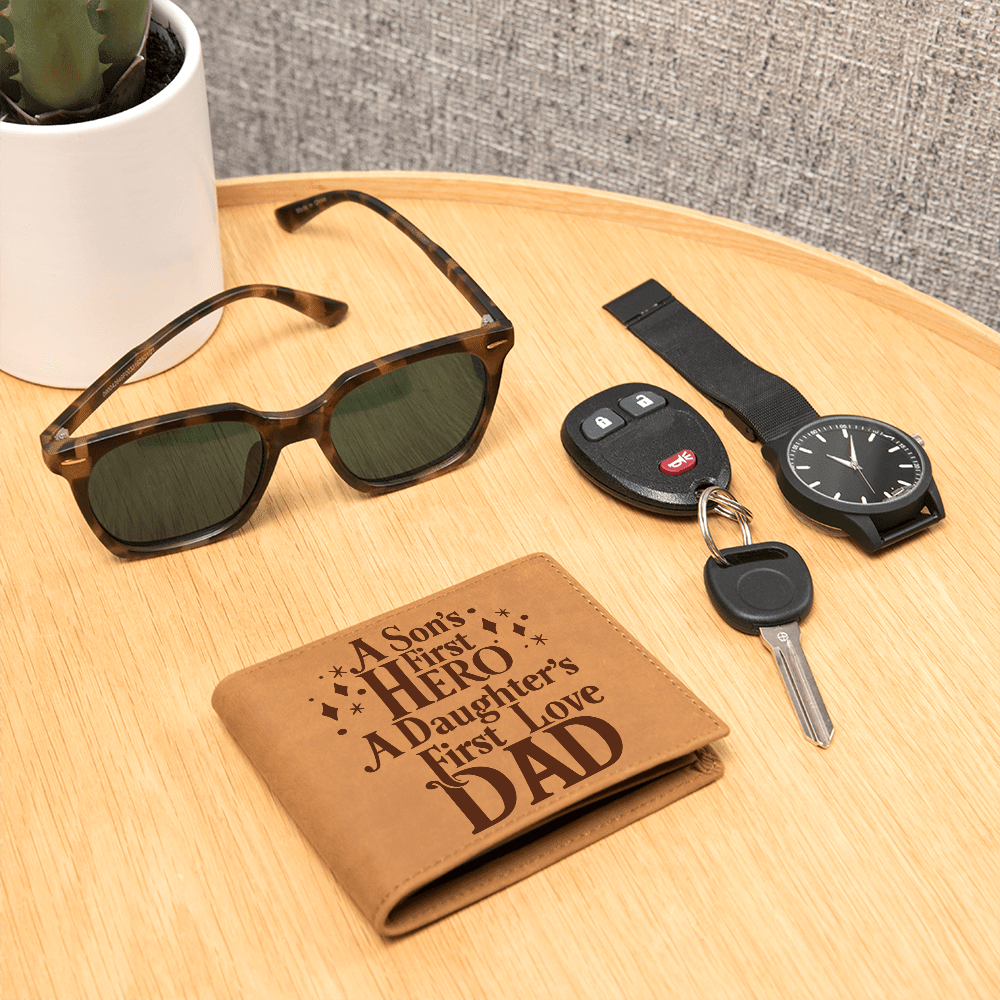 Leather -wallet- with- graphic -design- sitting- on- Table- top -with- watch -car -keys- and -Sun- Glasses.